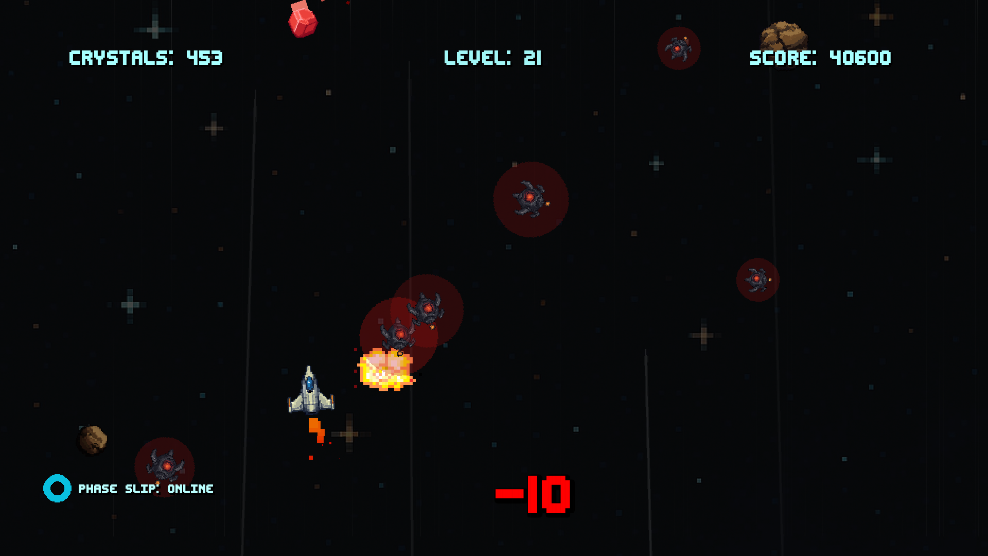 Crystal Drive gameplay late in a run, with a denser field of asteroids and mines